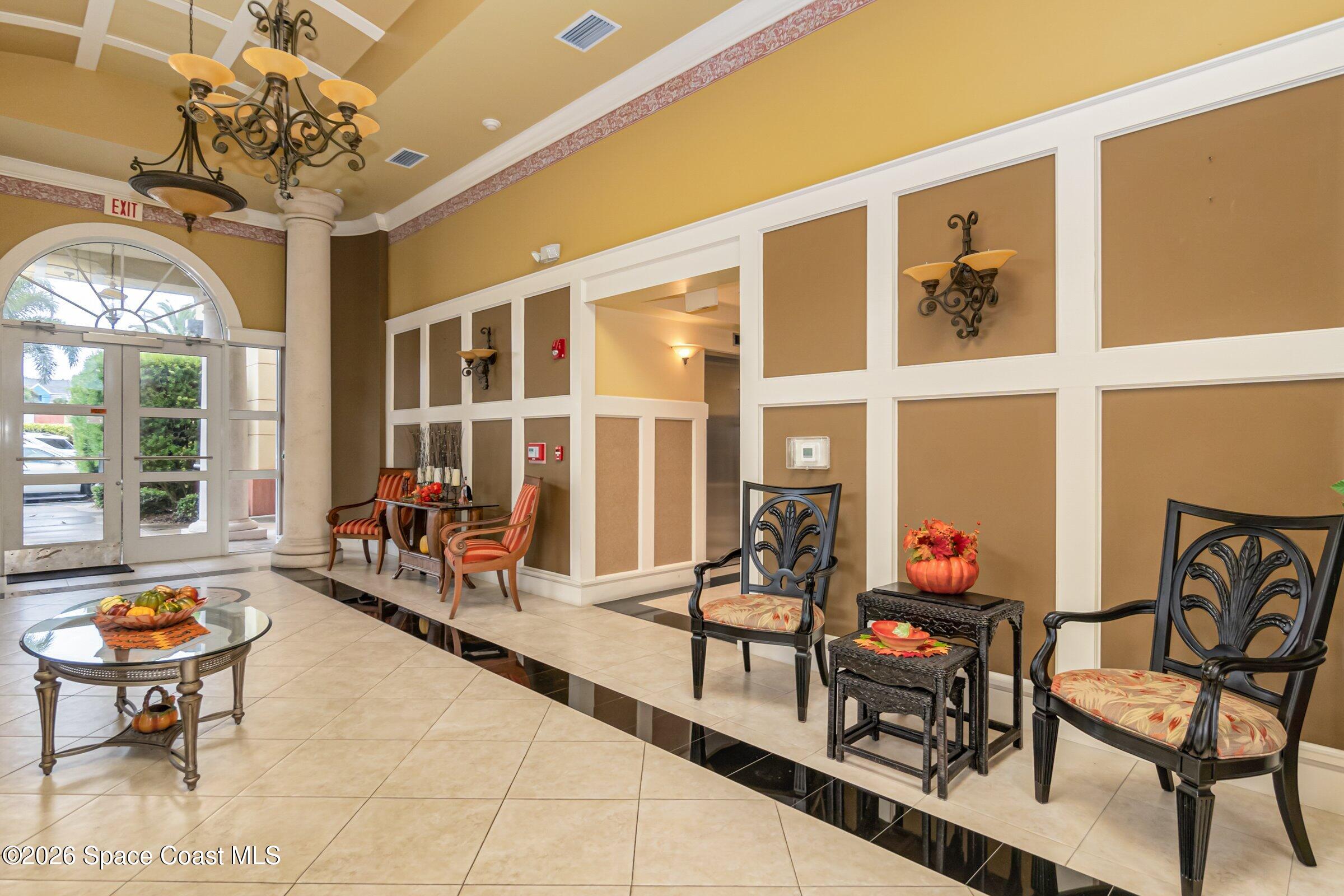 4975 Dixie Highway Northeast, Unit 301 Palm Bay, FL 32905 - Photo 14 of 61 4975-Dixie-Venetian Bay Lobby 3