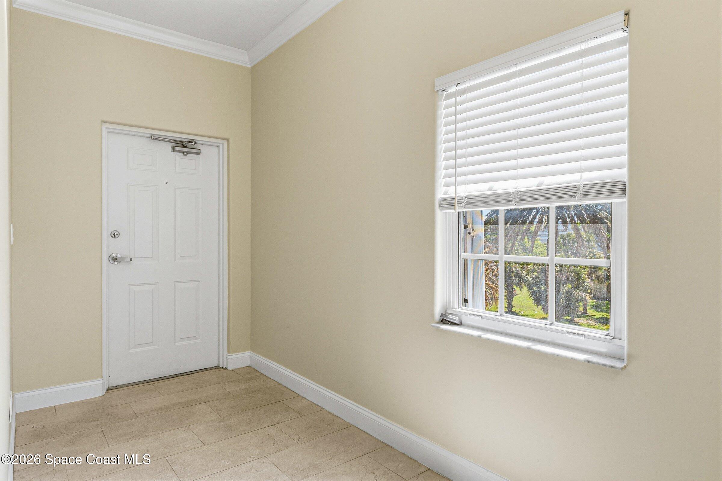 4975 Dixie Highway Northeast, Unit 301 Palm Bay, FL 32905 - Photo 45 of 61 4975-Dixie Unit 301 Foyer