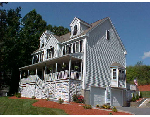 210 Boxford Road Haverhill, MA 01835 - Photo 1 of 8 a front view of a house with a yard