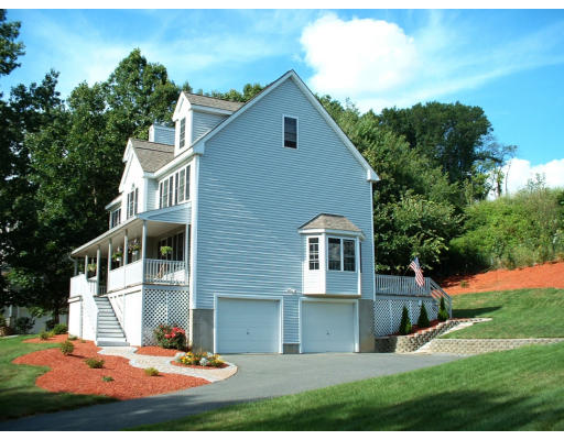 210 Boxford Road Haverhill, MA 01835 - Photo 2 of 8 a front view of a house with a yard