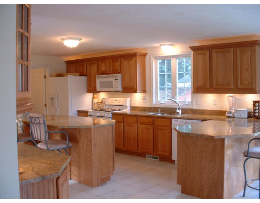 210 Boxford Road Haverhill, MA 01835 - Photo 4 of 8 a kitchen with kitchen island granite countertop a sink counter top space and appliances