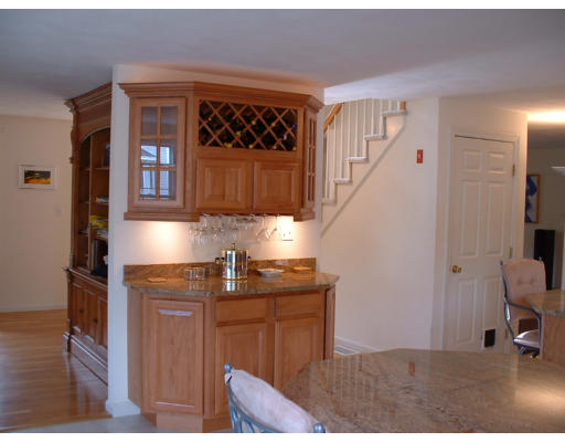 210 Boxford Road Haverhill, MA 01835 - Photo 5 of 8 a kitchen with a sink a refrigerator and cabinets