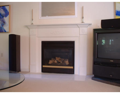 210 Boxford Road Haverhill, MA 01835 - Photo 7 of 8 a living room with a fireplace