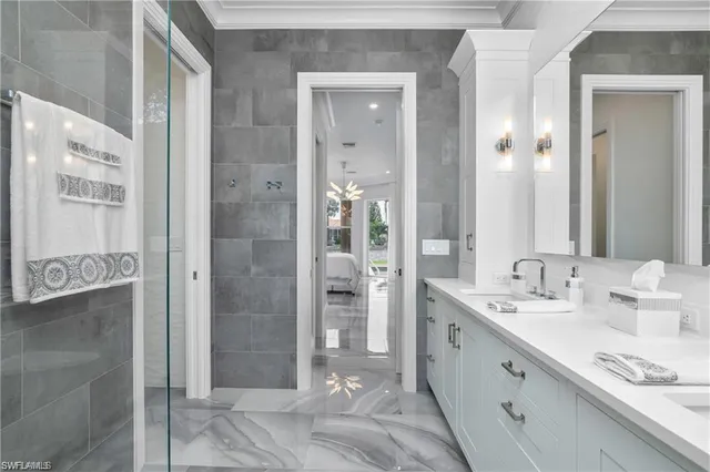 a spacious bathroom with a shower and a sink
