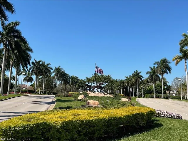 a view of a swimming pool with a garden