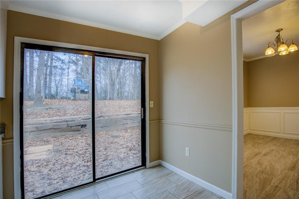 1457 Cherry Hill Road Southwest Conyers, GA 30094 - Photo 14 of 31 a view of a glass door with a glass door