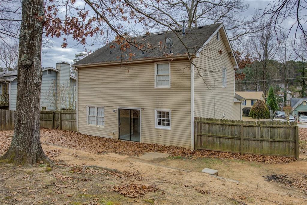 1457 Cherry Hill Road Southwest Conyers, GA 30094 - Photo 31 of 31 a view of a backyard