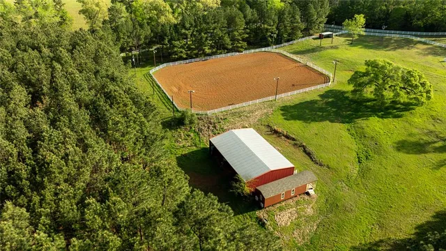a view of yard with swimming pool