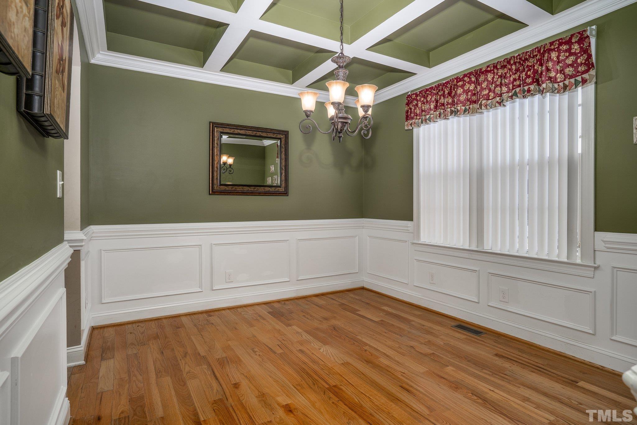 5058 Colorado Road Bailey, NC 27807 - Photo 11 of 27 a view of an empty room with wooden floor and a window