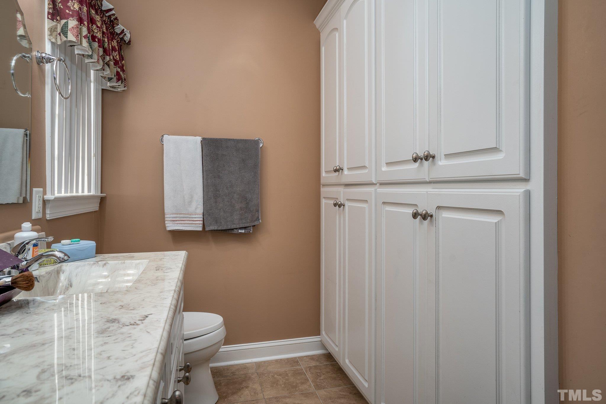 5058 Colorado Road Bailey, NC 27807 - Photo 15 of 27 a bathroom with a sink toilet and vanity