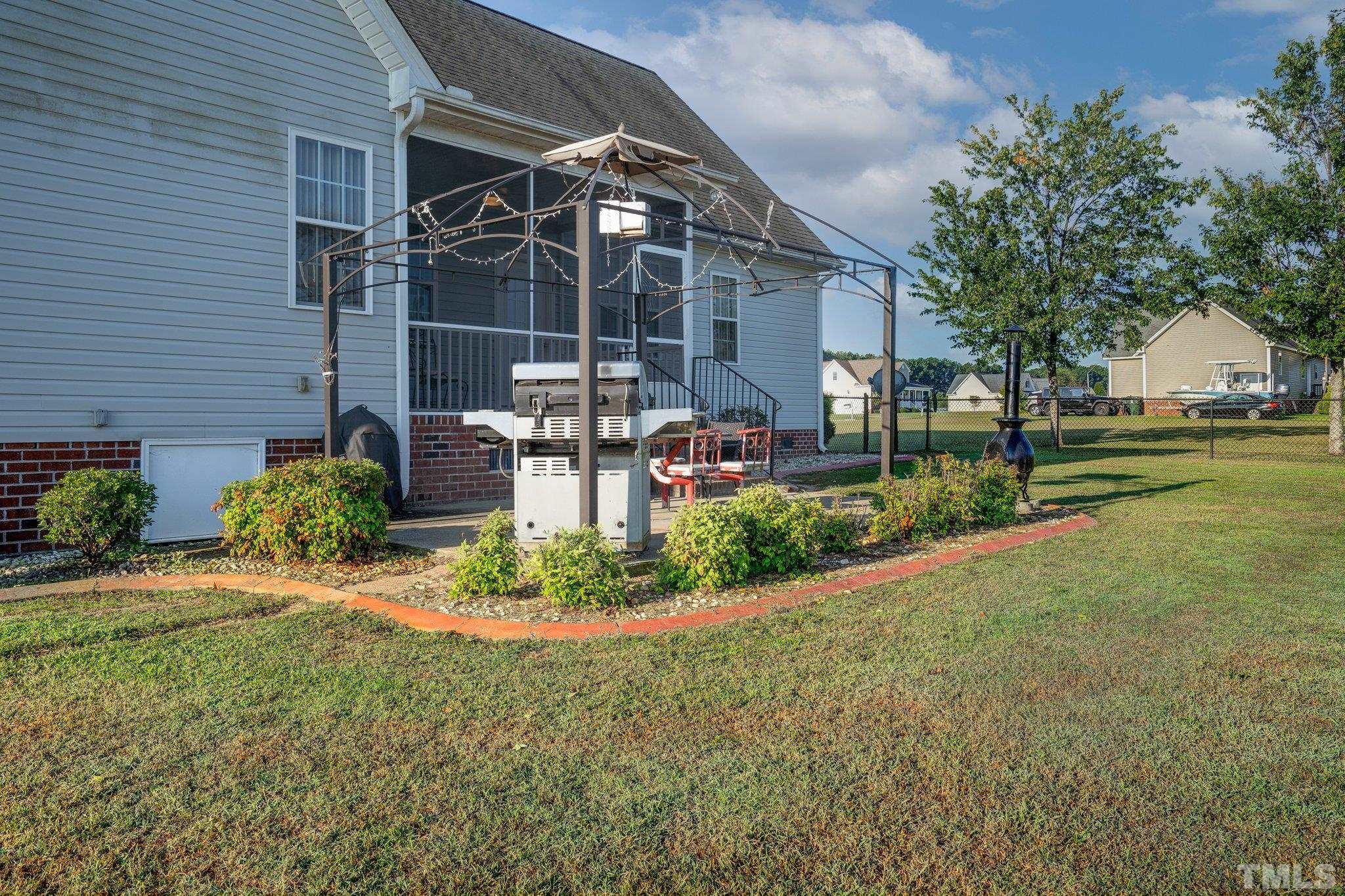 5058 Colorado Road Bailey, NC 27807 - Photo 23 of 27 a view of a house with a yard