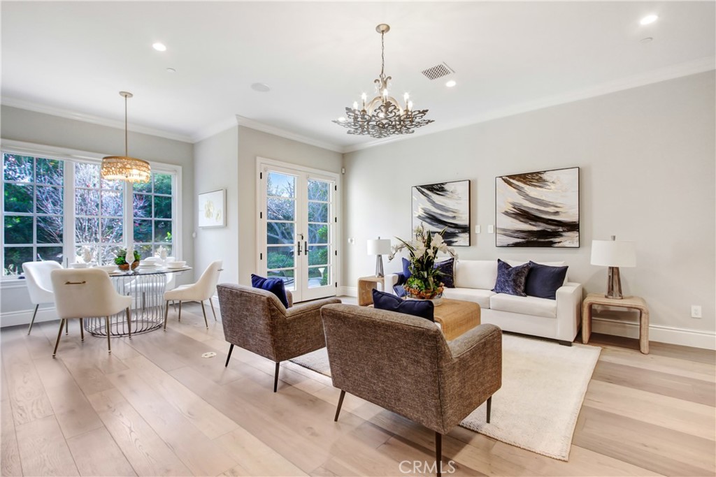 400 Santa Rosa Road Arcadia, CA 91007 - Photo 16 of 47 a living room with furniture and a chandelier