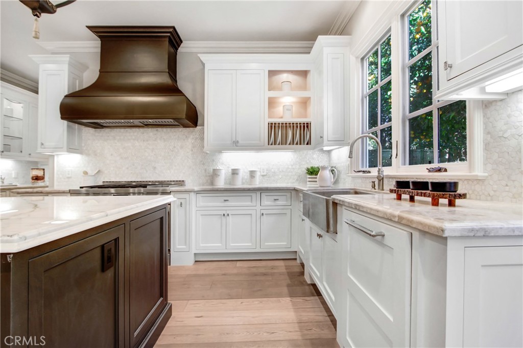 400 Santa Rosa Road Arcadia, CA 91007 - Photo 19 of 47 a kitchen with a sink dishwasher a stove and a microwave