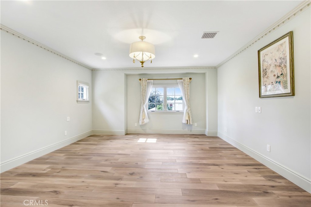 400 Santa Rosa Road Arcadia, CA 91007 - Photo 39 of 47 wooden floor in an empty room with a window