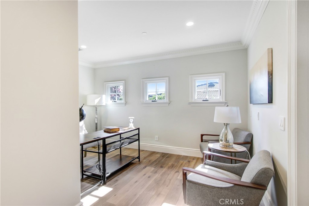 400 Santa Rosa Road Arcadia, CA 91007 - Photo 41 of 47 a living room with furniture and a wooden floor