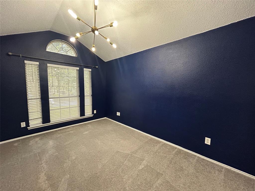 2816 Beaty Court Fort Worth, TX 76112 - Photo 18 of 24 a view of an empty room with a window