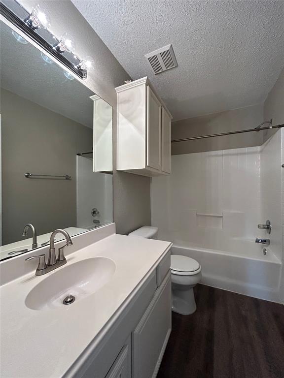 2816 Beaty Court Fort Worth, TX 76112 - Photo 19 of 24 a bathroom with a sink and a mirror