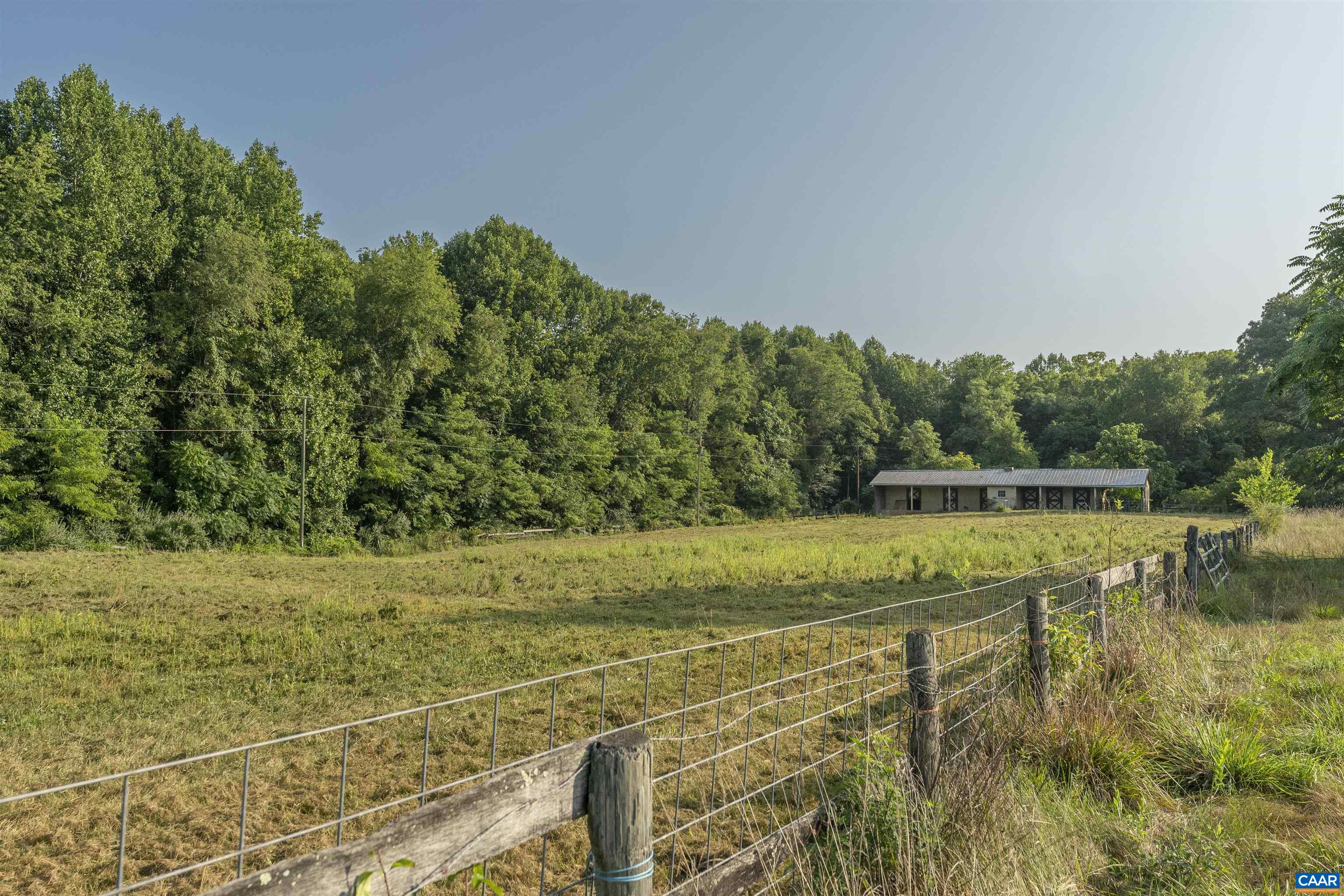 2599 Oak Park Road Madison, VA 22727 - Photo 36 of 43 a view of a lake with a yard