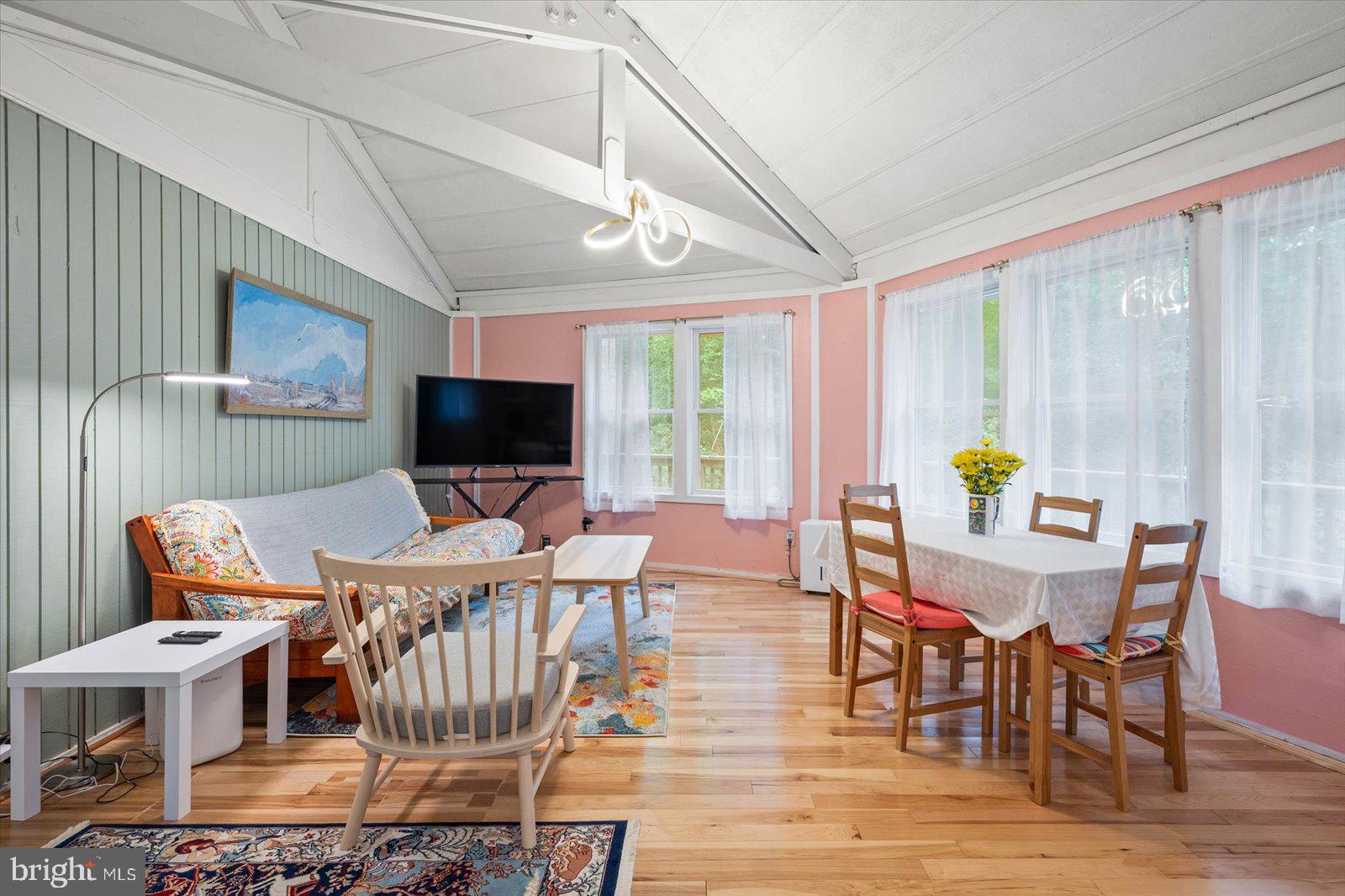 26 Pinehurst Road Ocean Pines, MD 21811 - Photo 7 of 87 a view of a dining room with furniture window and wooden floor