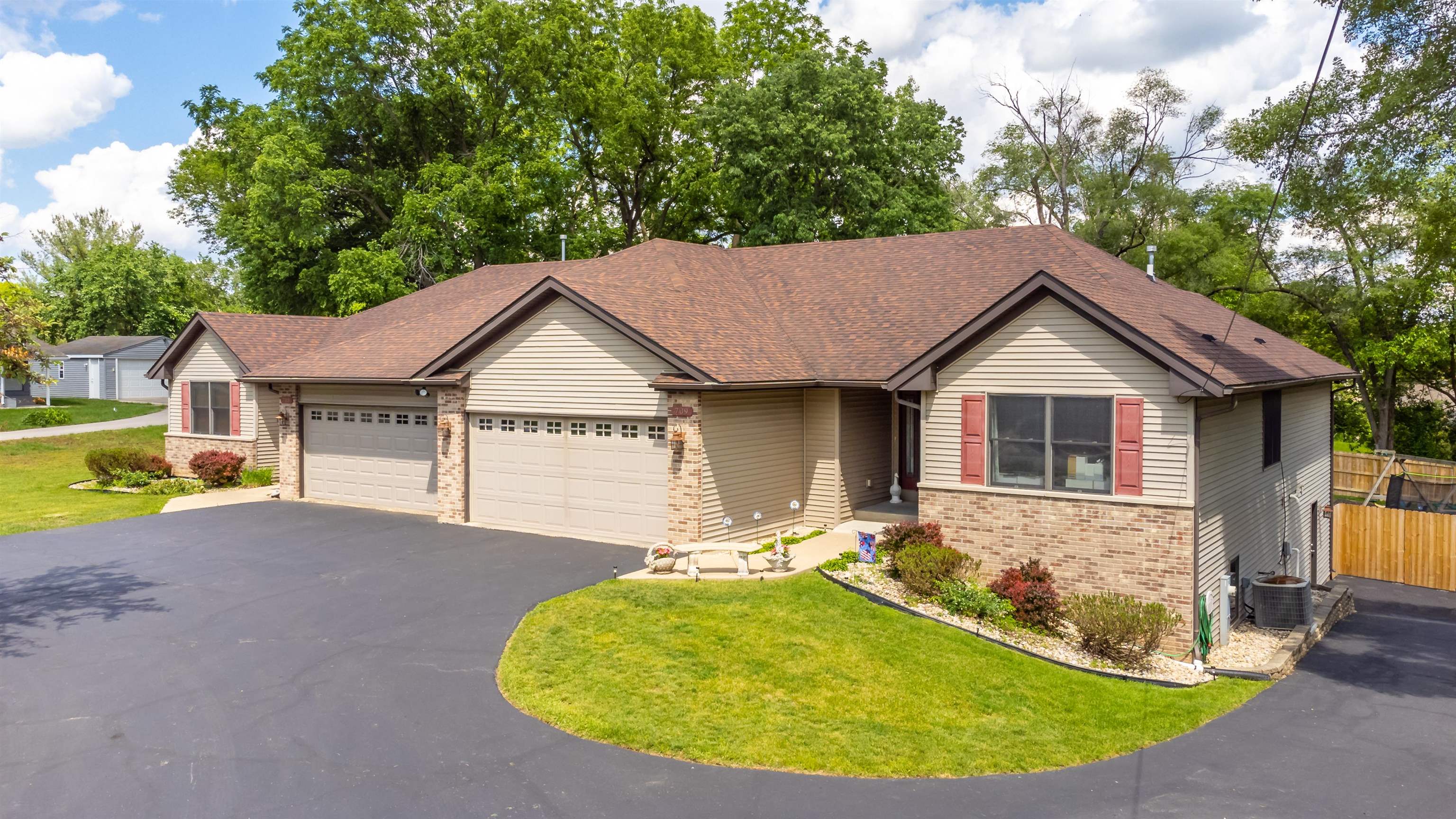 709 North Alpine Road Rockford, IL 61107 - Photo 1 of 47 a view of a house with a backyard and pool