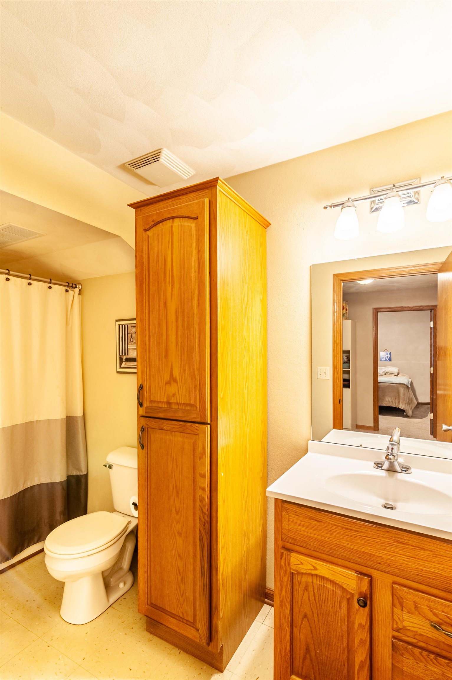 709 North Alpine Road Rockford, IL 61107 - Photo 38 of 47 a bathroom with a granite countertop sink toilet and shower