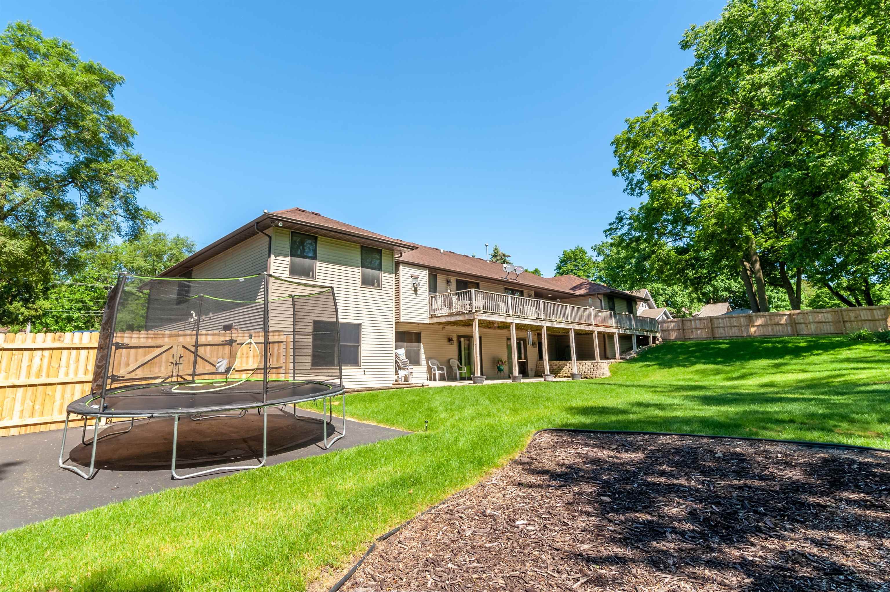 709 North Alpine Road Rockford, IL 61107 - Photo 9 of 47 a view of a house with a yard
