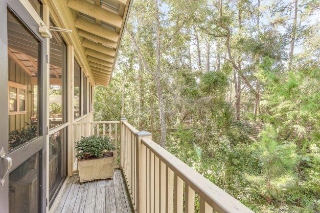 223 Grayton Trail Road Santa Rosa Beach, FL 32459 - Photo 22 of 22 a view of balcony with wooden floor and fence