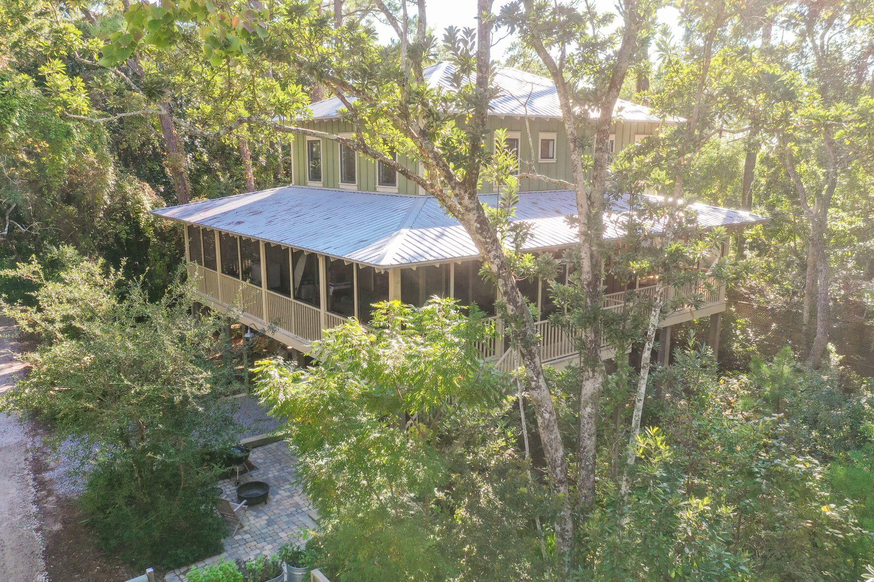 223 Grayton Trail Road Santa Rosa Beach, FL 32459 - Photo 4 of 22 a view of a house with a yard and tree s