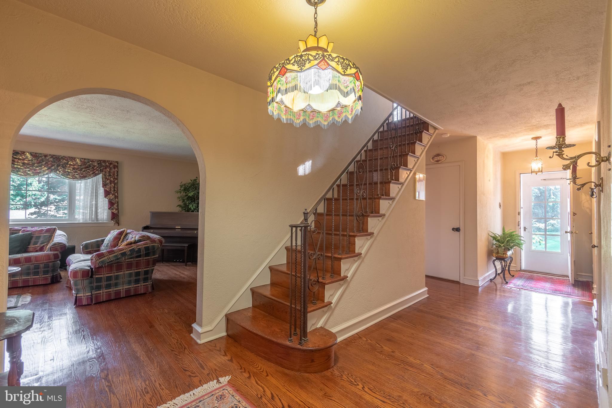 3360 Masons Mill Road Huntingdon Valley, PA 19006 - Photo 2 of 20 Foyer lovely hardwood stairs and iron railing