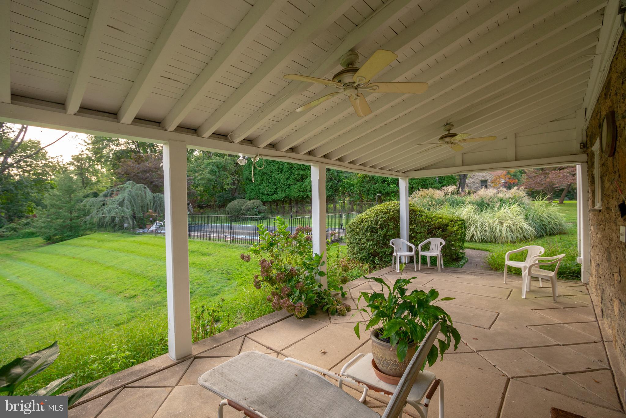 3360 Masons Mill Road Huntingdon Valley, PA 19006 - Photo 18 of 20 Covered Porch overlooking the pool