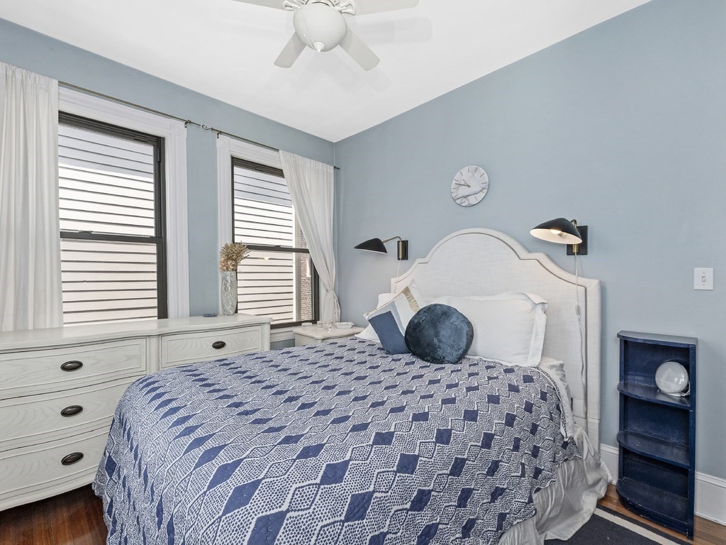 58 Winthrop Street, Unit 3 Boston, MA 02129 - Photo 7 of 14 a bedroom with a large bed and a window