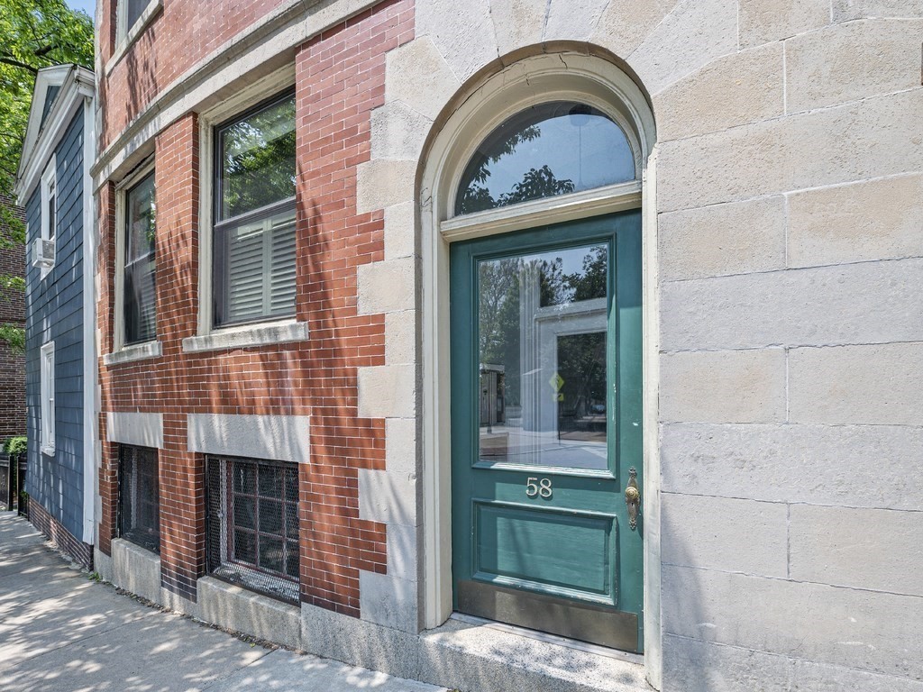 58 Winthrop Street, Unit 3 Boston, MA 02129 - Photo 10 of 14 a front view of a house with a garden
