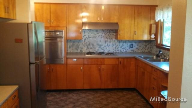 121 Brockway Road Yale, MI 48097 - Photo 3 of 14 This is another view of the kitchen.
