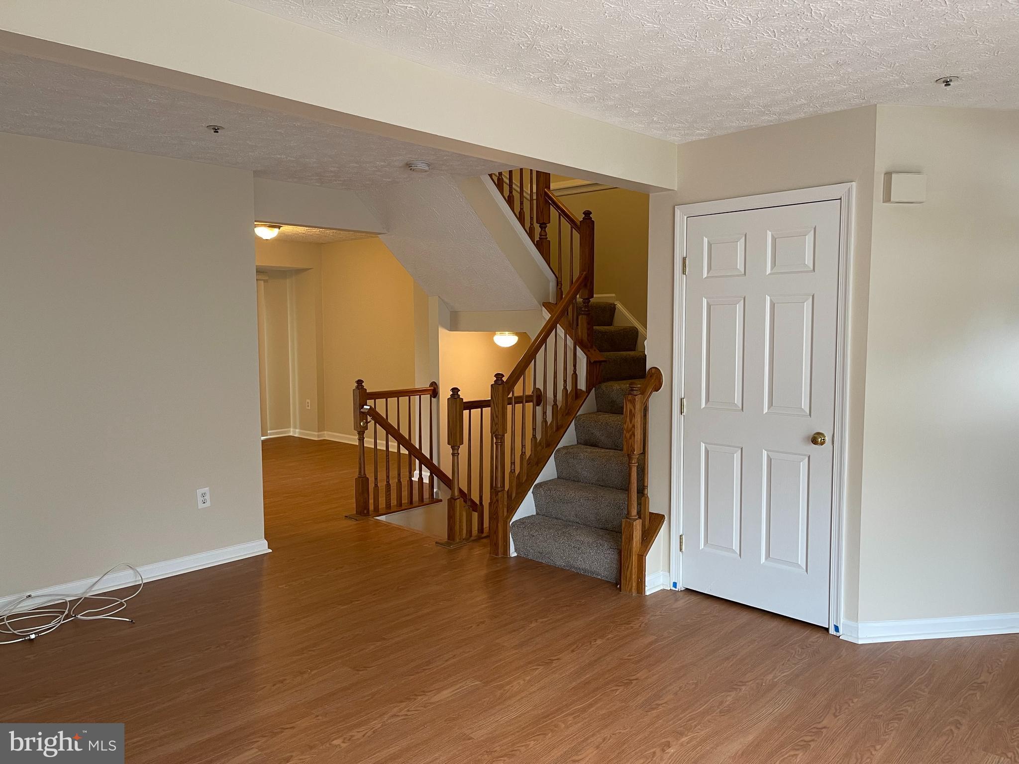147 Foxview Drive Glen Burnie, MD 21061 - Photo 2 of 12 a view of entryway with wooden floor