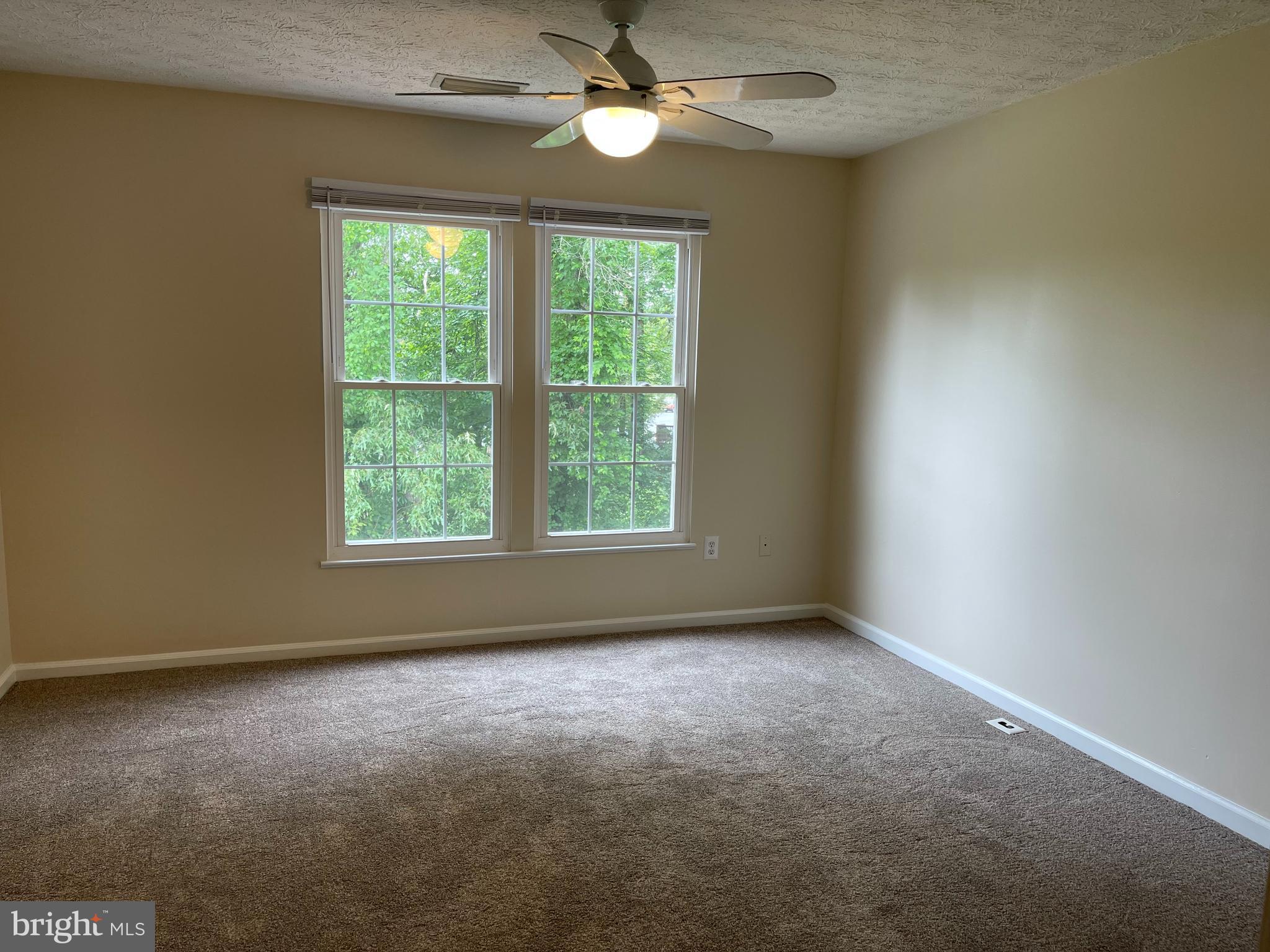 147 Foxview Drive Glen Burnie, MD 21061 - Photo 6 of 12 an empty room with a window