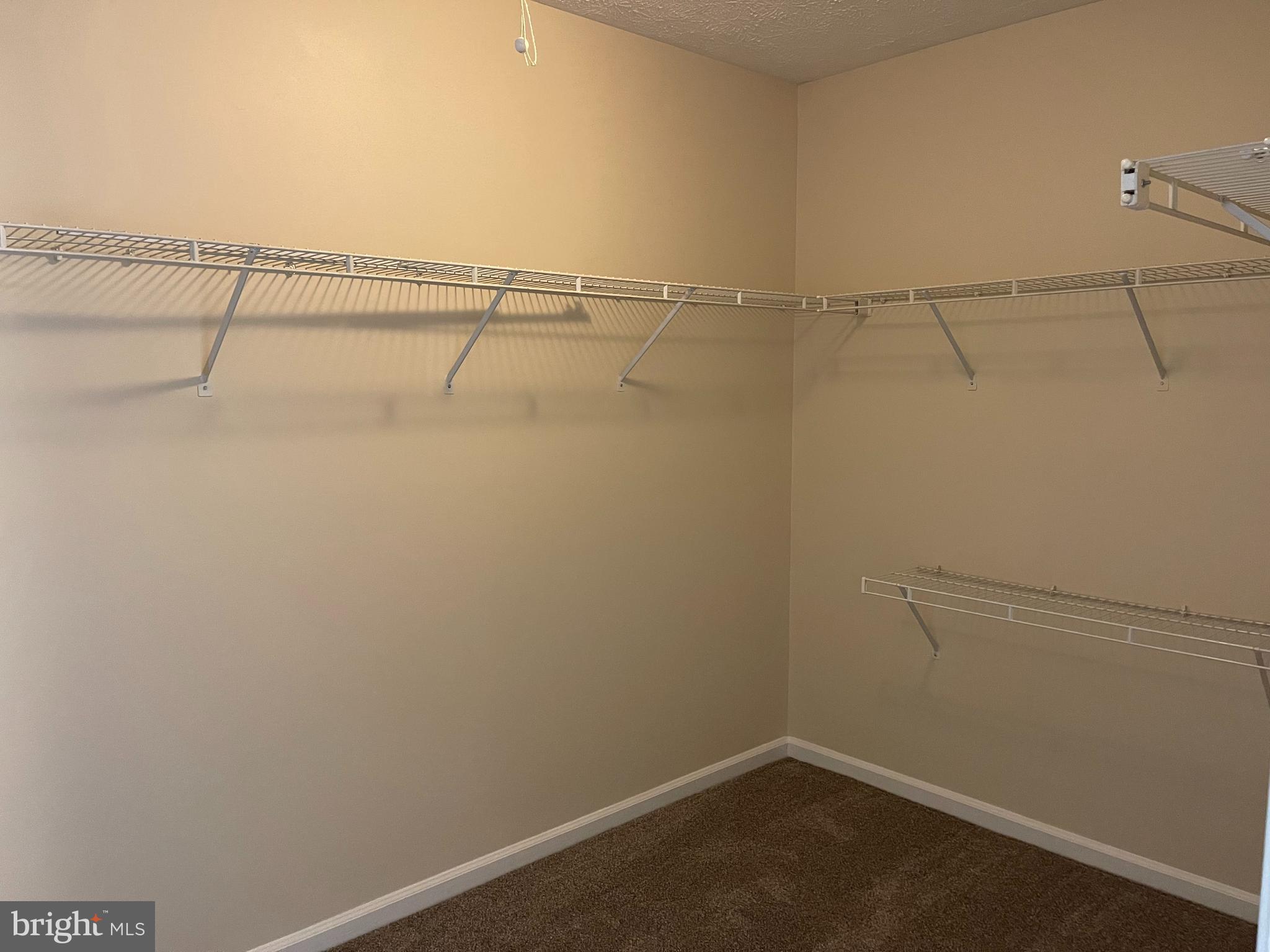 147 Foxview Drive Glen Burnie, MD 21061 - Photo 7 of 12 a view of a room with racks on the wall