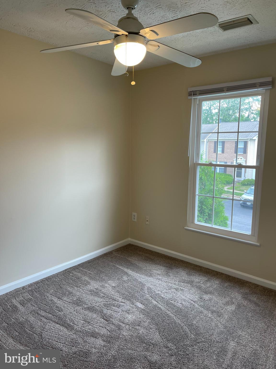 147 Foxview Drive Glen Burnie, MD 21061 - Photo 9 of 12 an empty room with a window