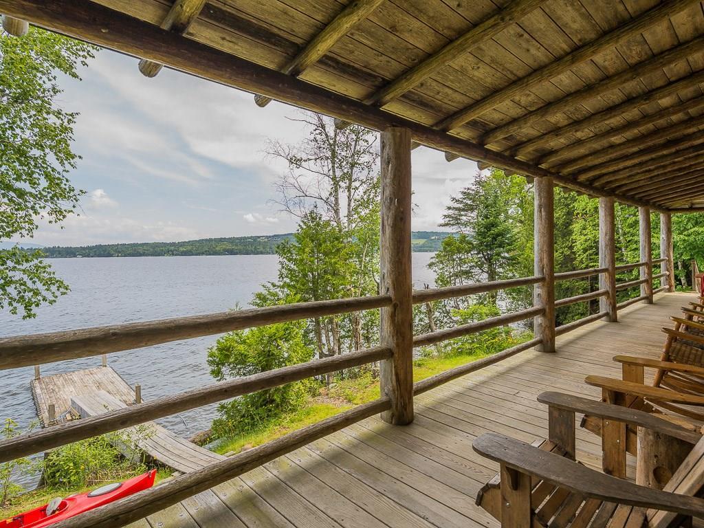 106 Herring Road Rangeley, ME 04970 - Photo 3 of 25 sit on your wrap around porch and...