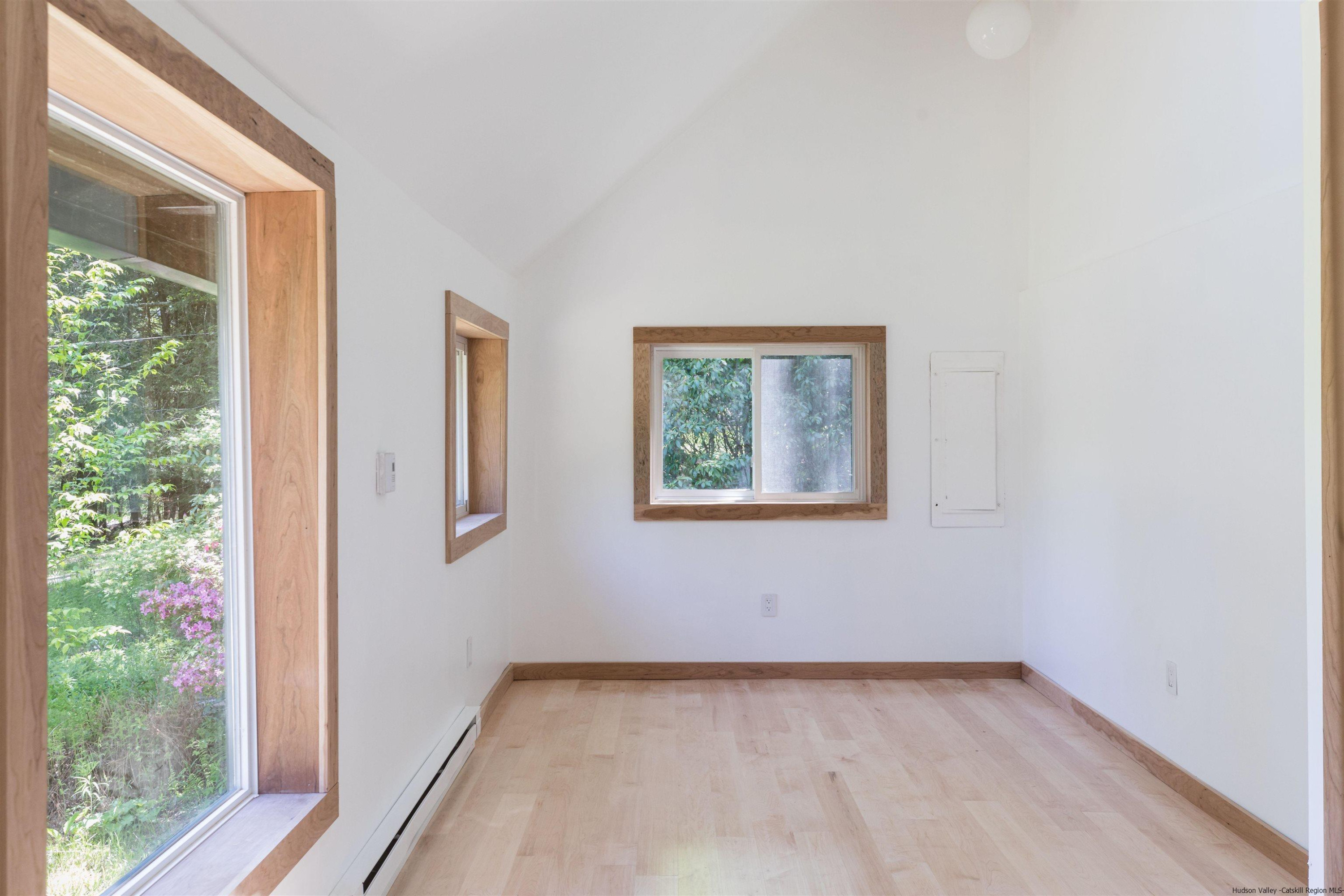 356 Mink Brook Road Colchester, NY 13755 - Photo 11 of 25 an empty room with a window