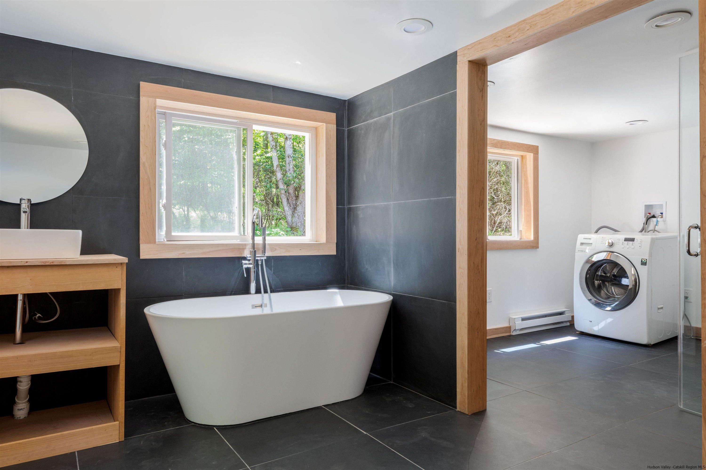 356 Mink Brook Road Colchester, NY 13755 - Photo 14 of 25 a living room with furniture and a window