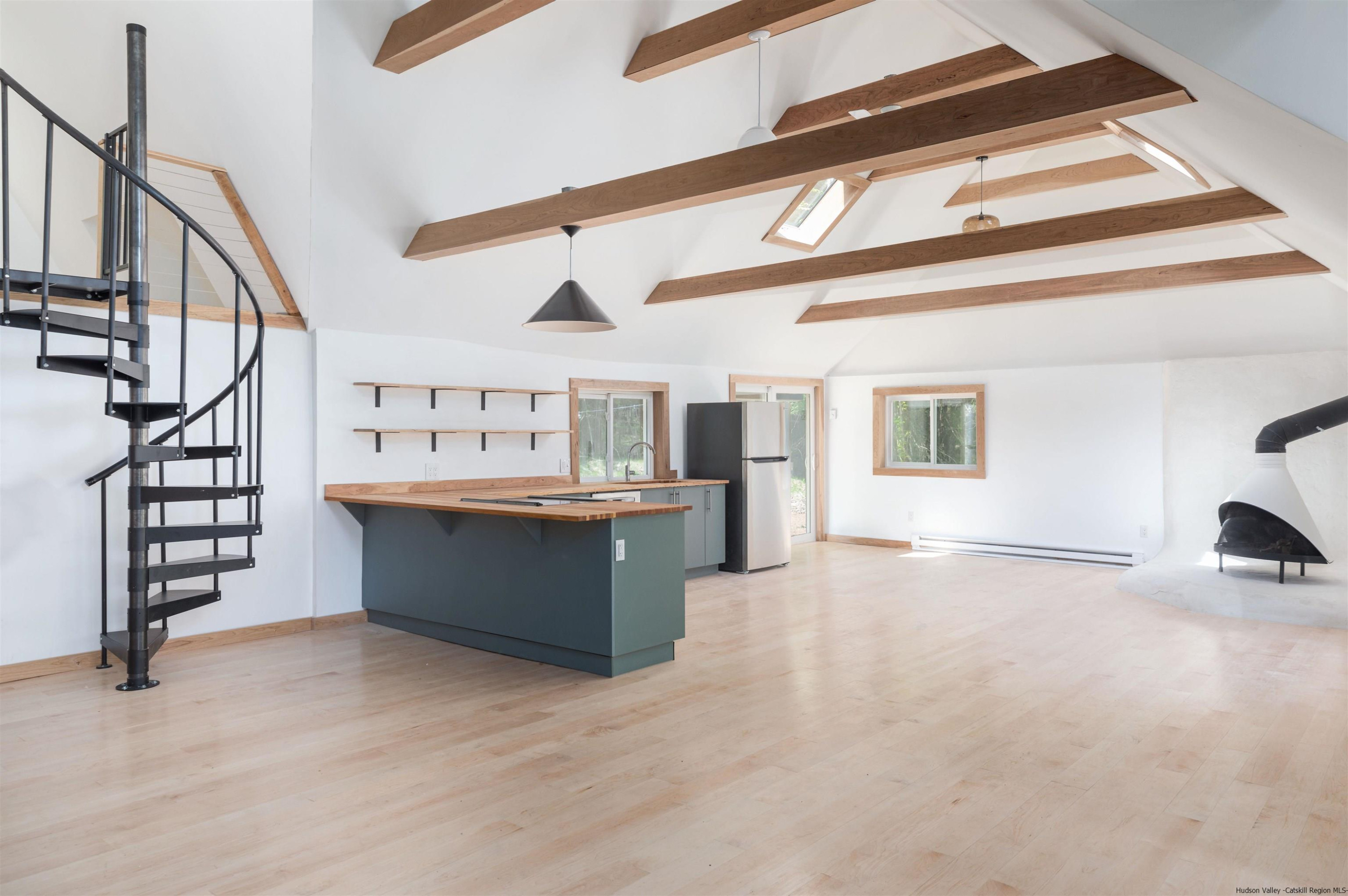 356 Mink Brook Road Colchester, NY 13755 - Photo 15 of 25 a view of kitchen with furniture and staircase
