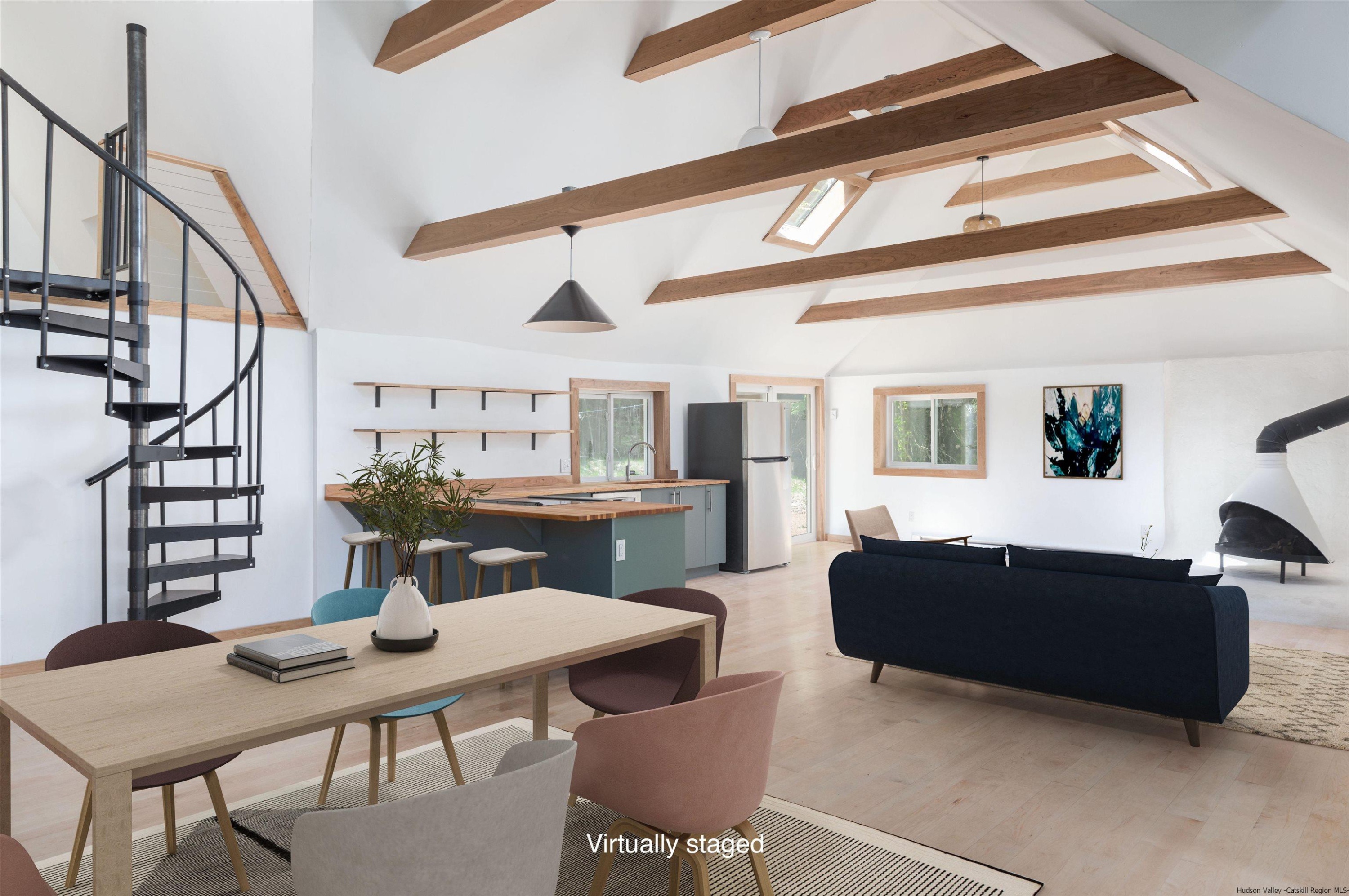 356 Mink Brook Road Colchester, NY 13755 - Photo 2 of 25 a living room with furniture and wooden floor
