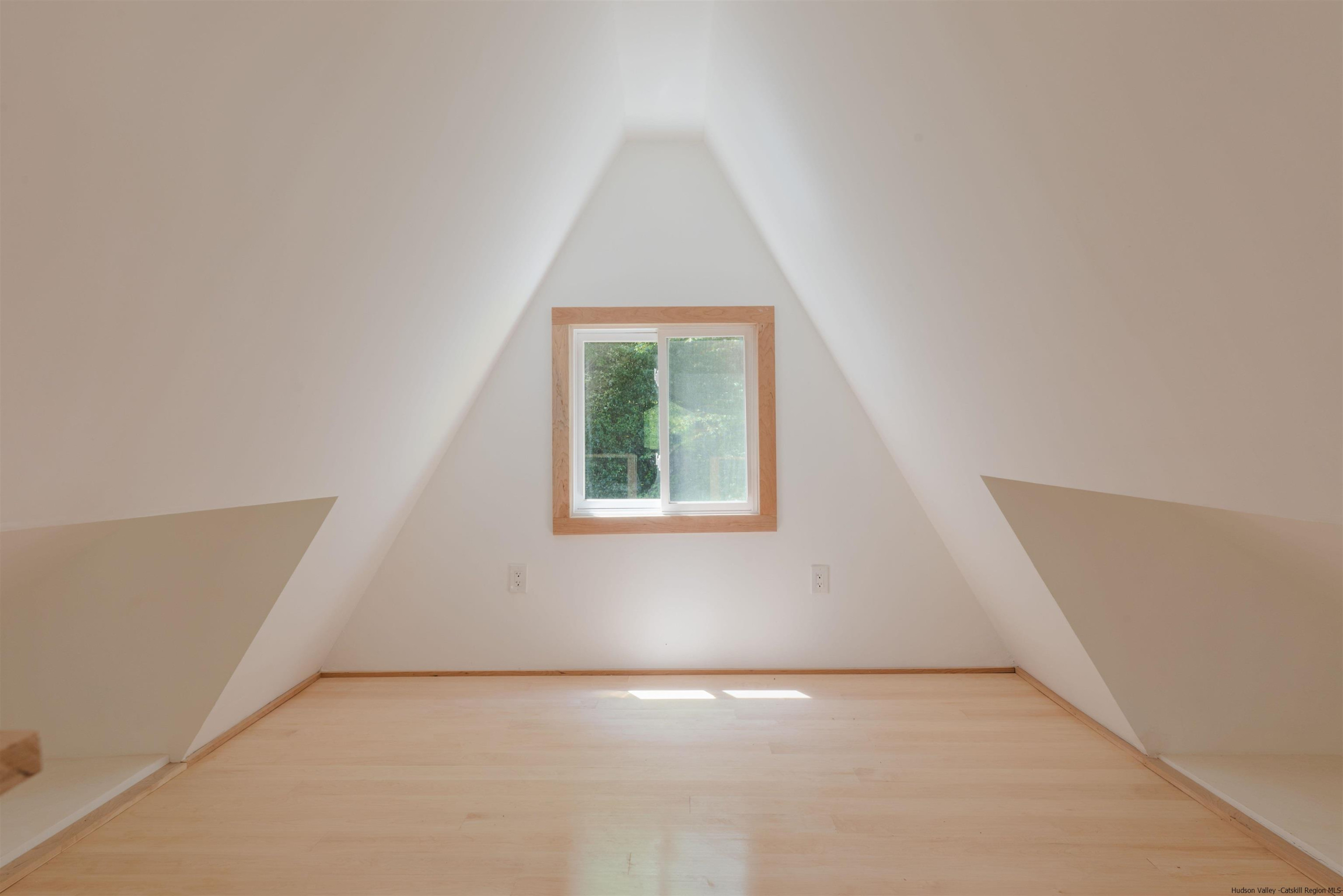 356 Mink Brook Road Colchester, NY 13755 - Photo 8 of 25 an empty room with a window