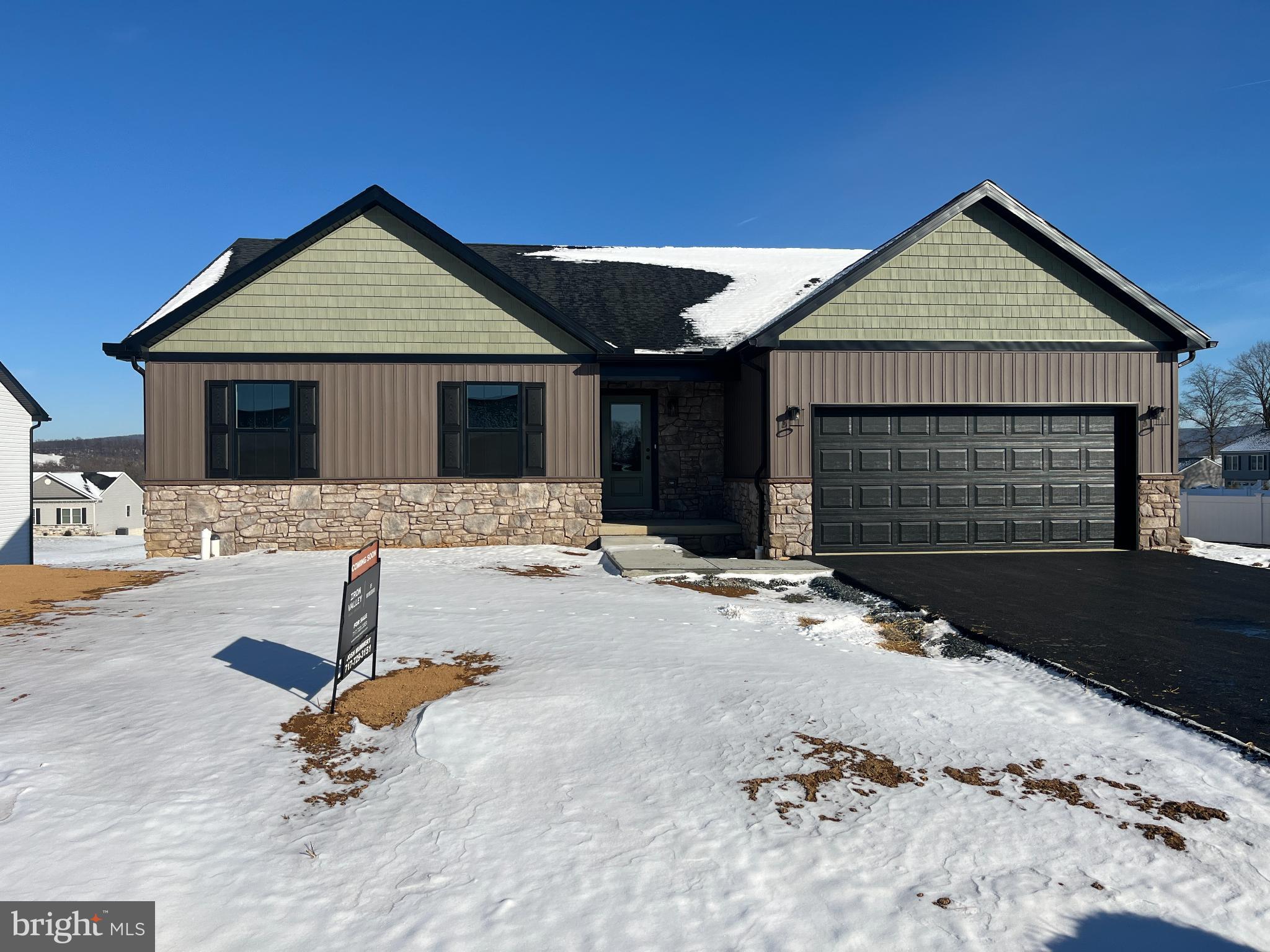 a front view of a house with yard
