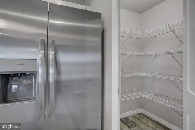 a view of a small space with racks on the wall