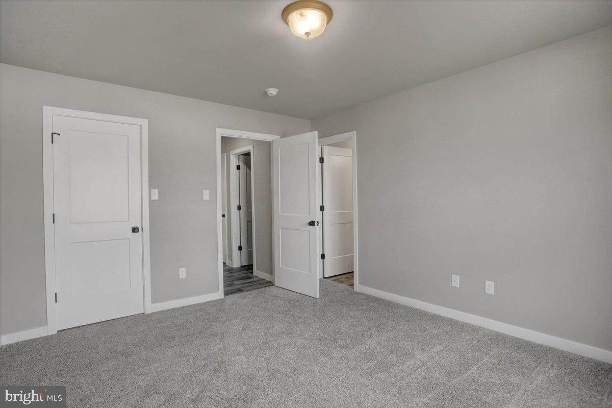 10059 Pendleton Avenue Waynesboro, PA 17268 - Photo 25 of 35 Spacious room with neutral tones and light.