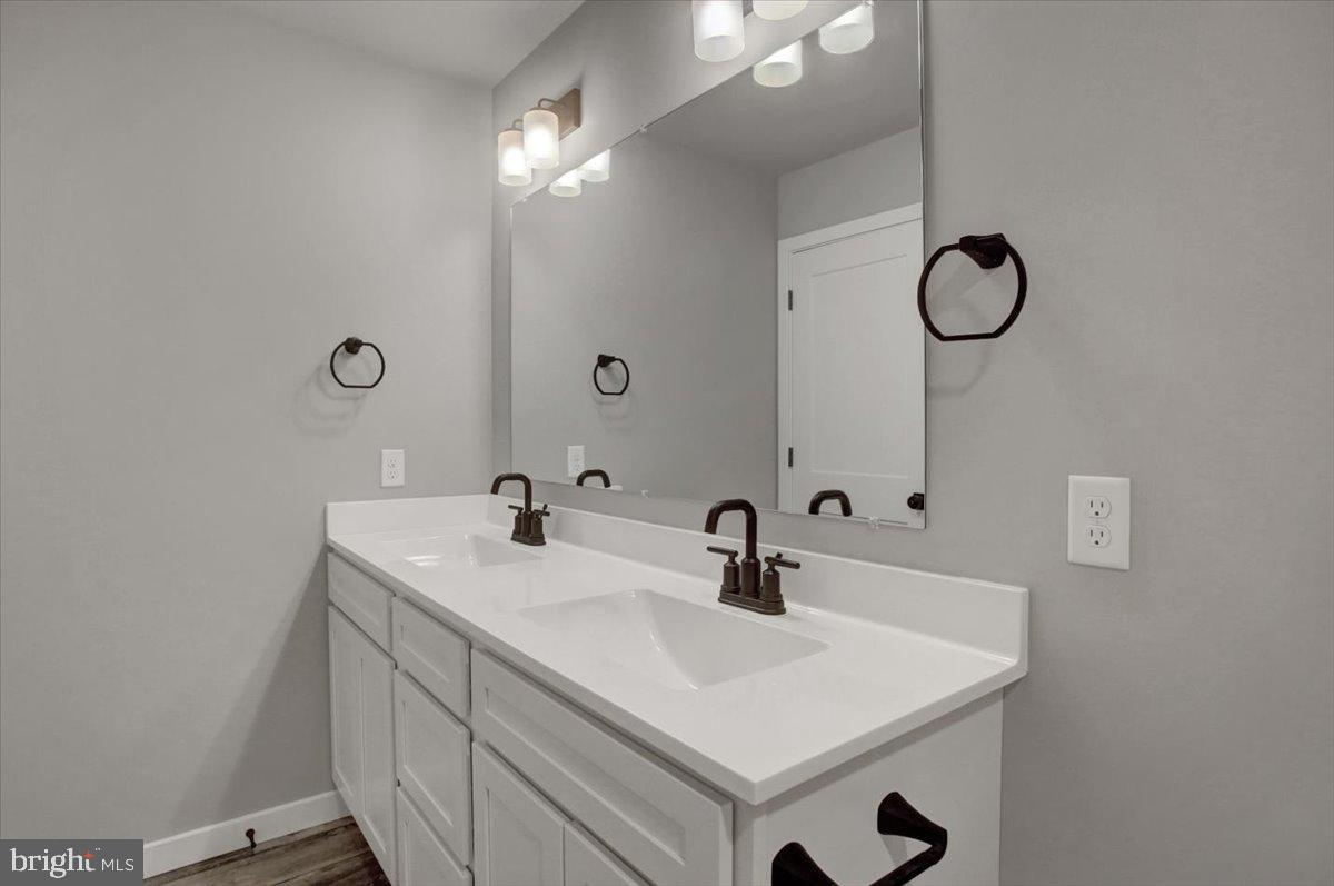 10059 Pendleton Avenue Waynesboro, PA 17268 - Photo 28 of 35 Sleek modern bathroom with dual sinks.