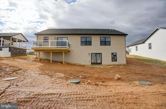 a view of a balcony with wooden floor