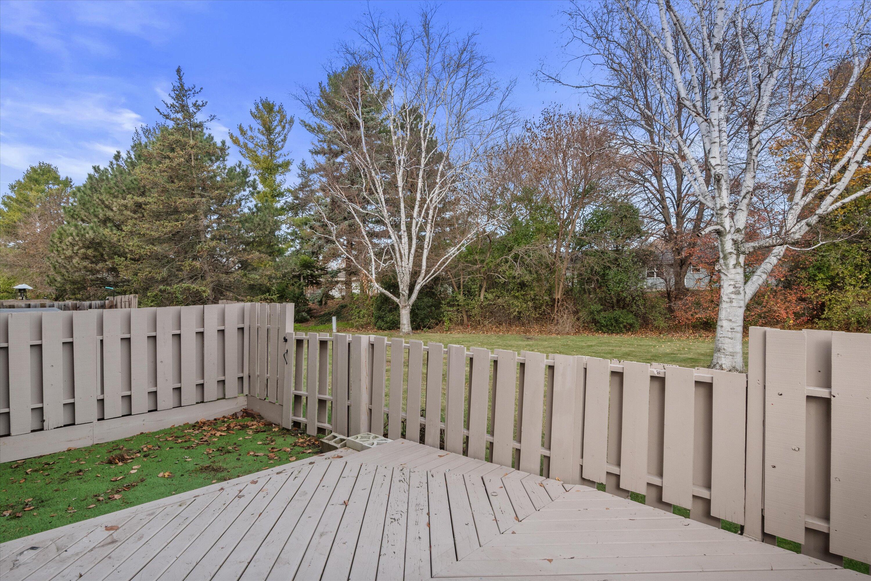 5740 Cambridge Lane, Unit 6 Mount Pleasant, WI 53406 - Photo 28 of 32 Back Deck