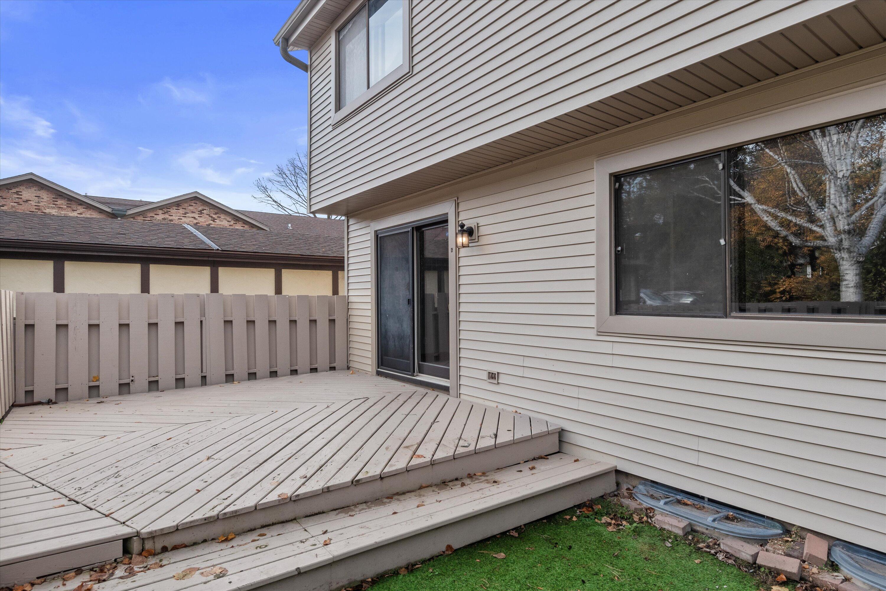 5740 Cambridge Lane, Unit 6 Mount Pleasant, WI 53406 - Photo 29 of 32 Back Deck